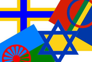 Bild på samlade minoritetsflaggor.