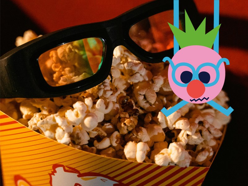 Popcorn och tecknad mascot-figur